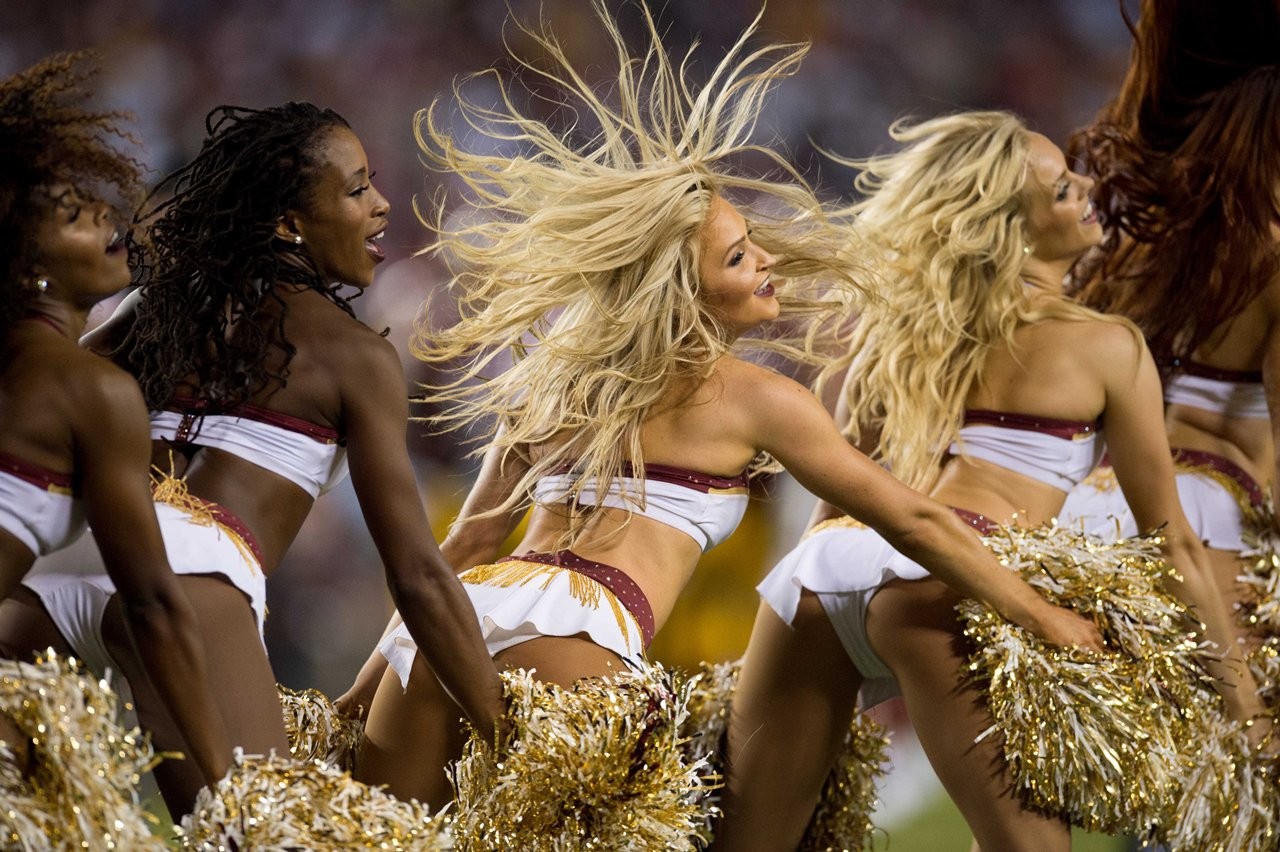 PHOTOS: Cheerleaders Root On The Redskins Over The Raiders.