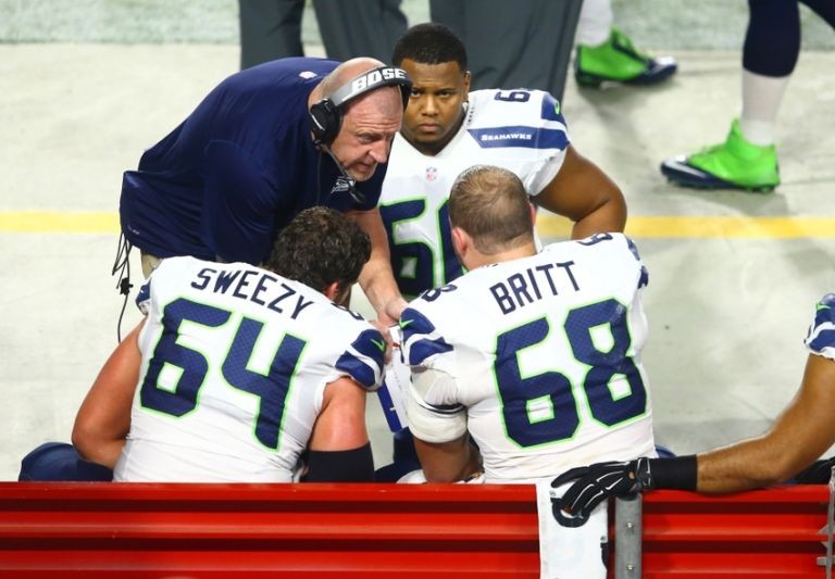 Seahawks' Offensive Line Faces Crushing Blow: Smith's Absence Throws Wrench in Playoff Hopes