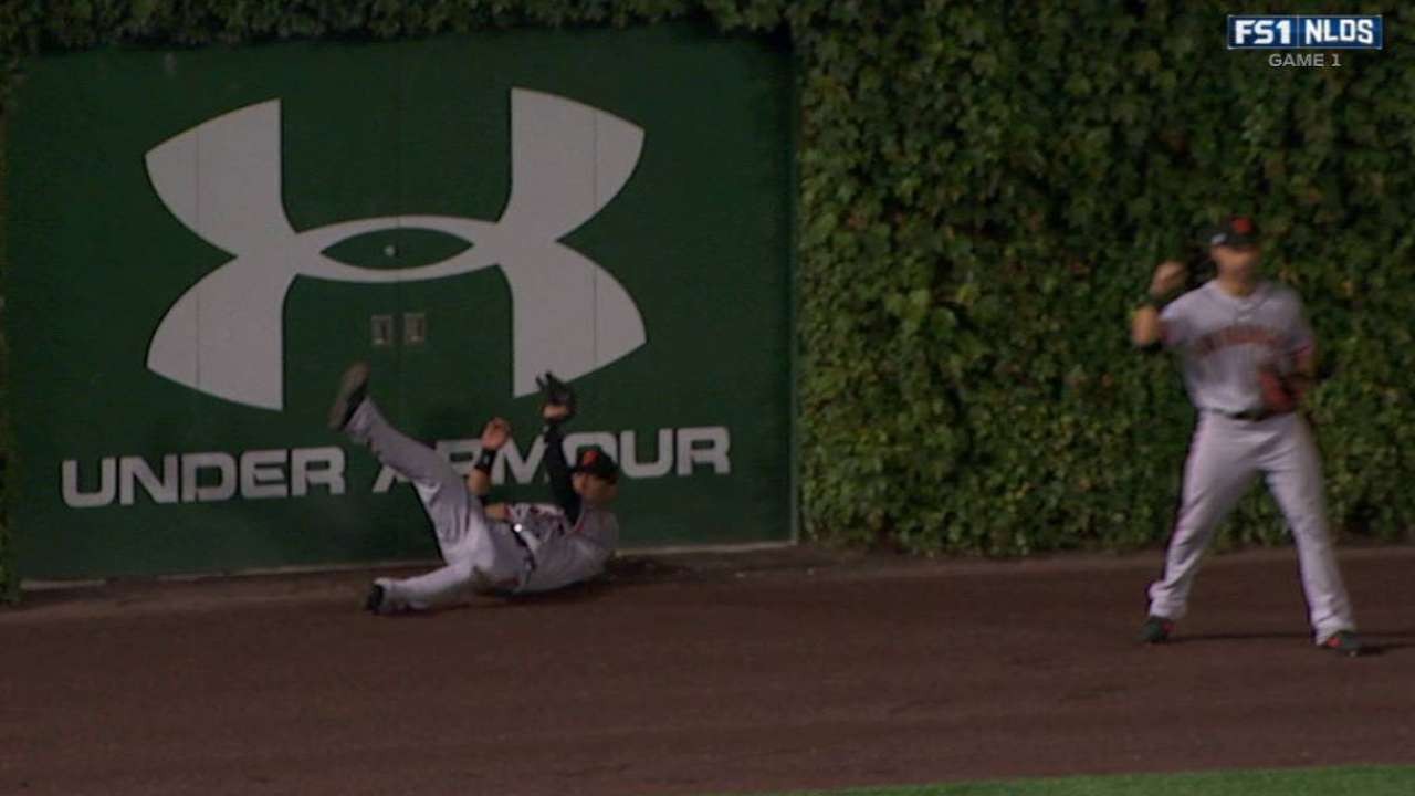 Giants' firstbase coach hit in face by foul ball