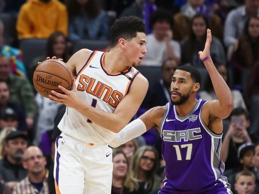 Devin Booker shakes off poor shooting night to close out