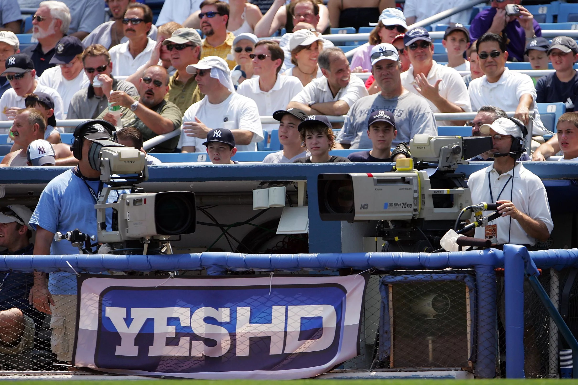 How does the sale of the YES Network affect Yankees fans?