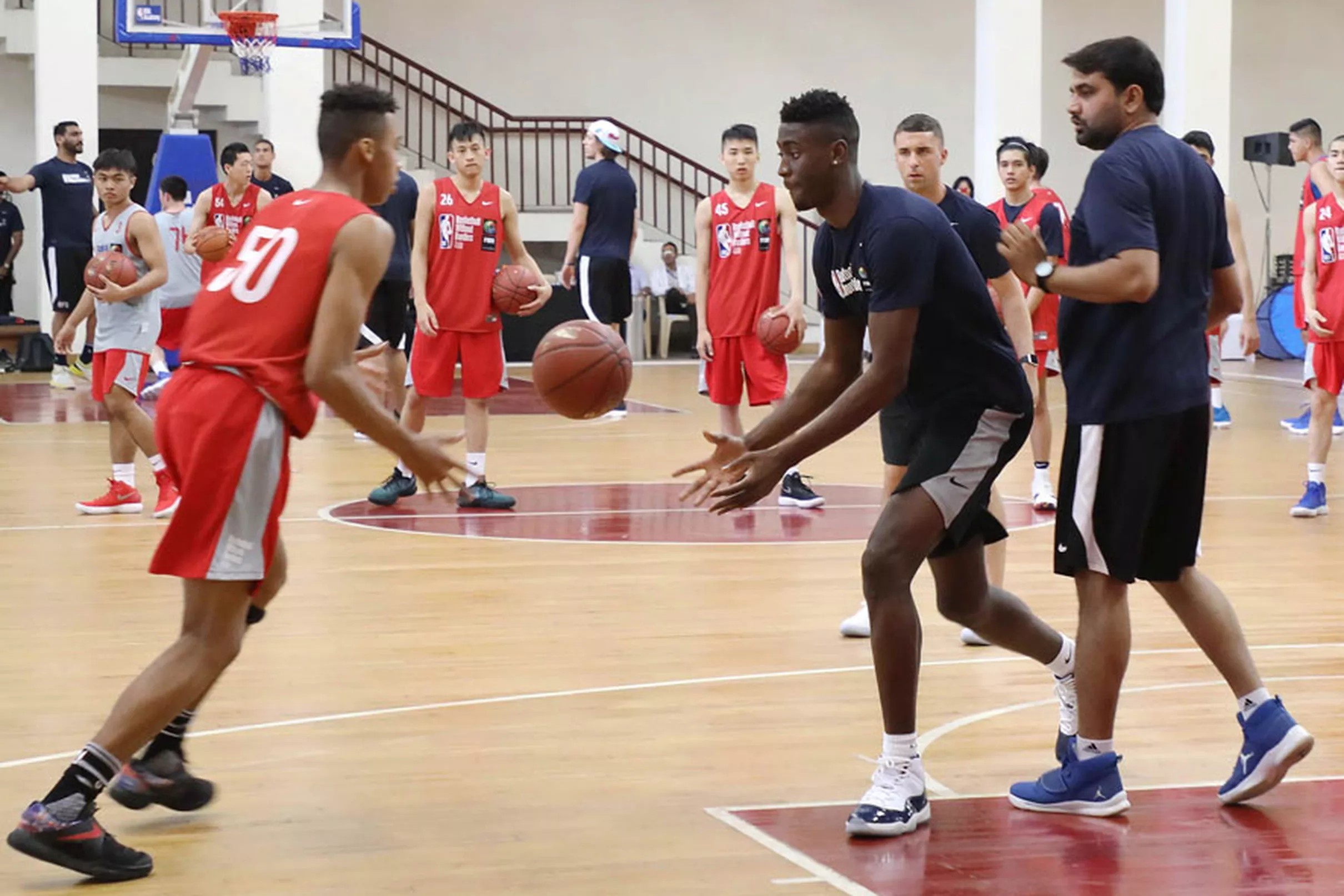 With two players in Asia, Nets commit to NBA priority