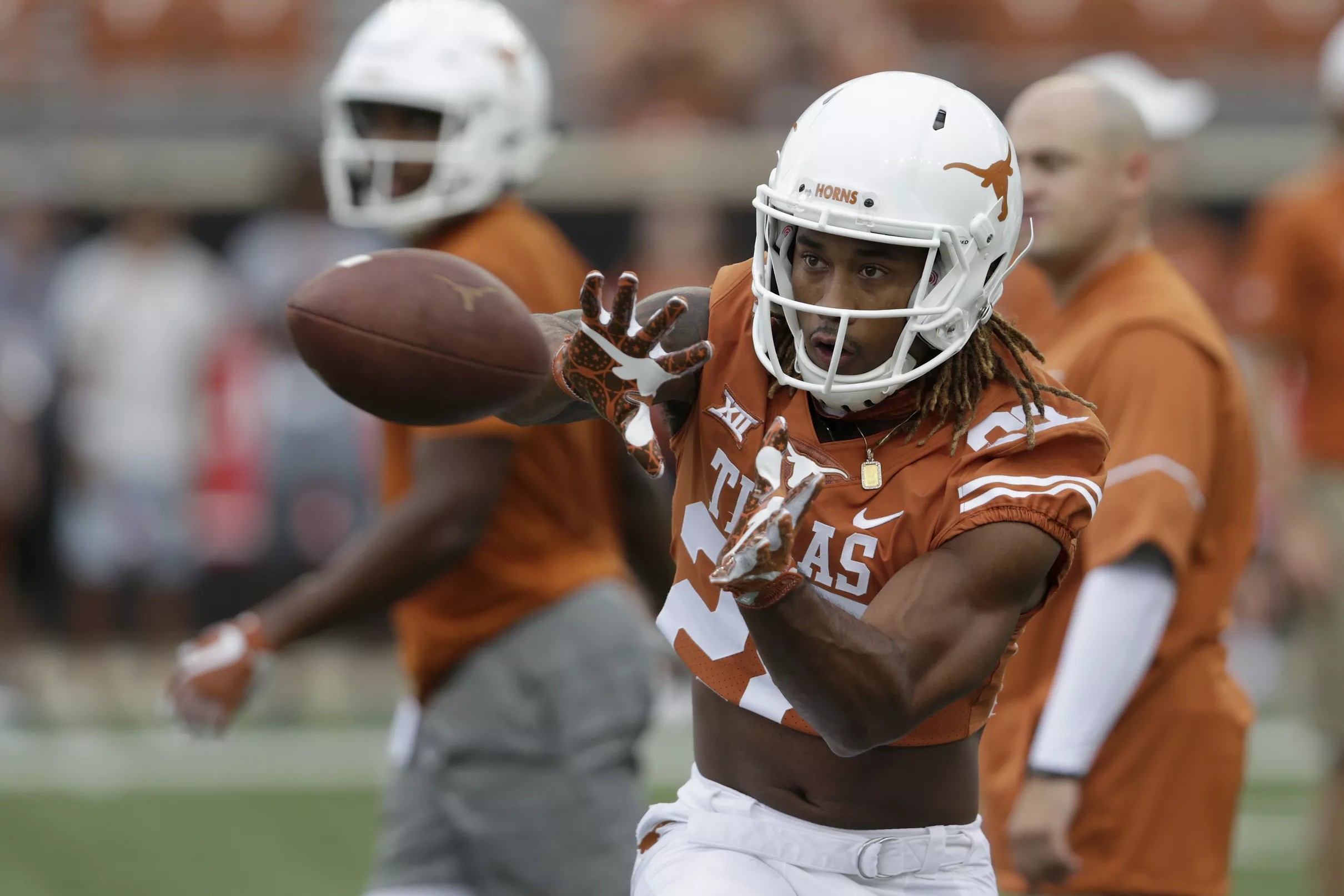 Texas RB Kirk Johnson hoping to reprise Fozzy Whittaker’s comeback tale