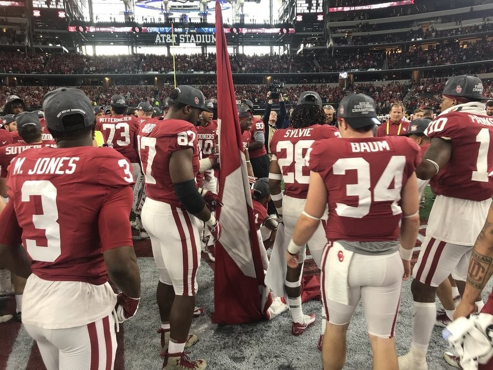 Erick Wren plants OU flag after winning Big 12 title at AT&T Stadium