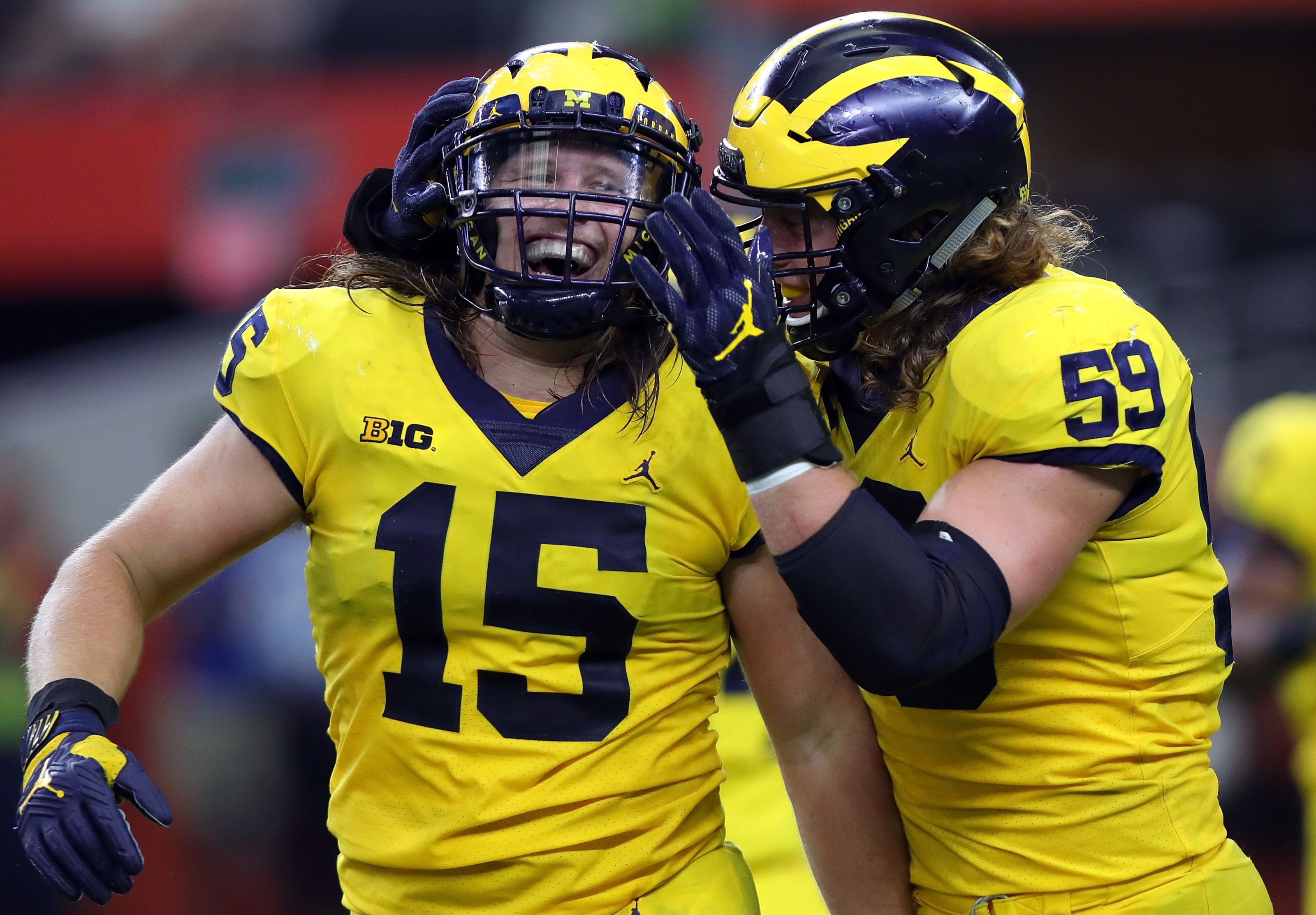 Which players will represent Michigan Football at Big Ten Media Days?