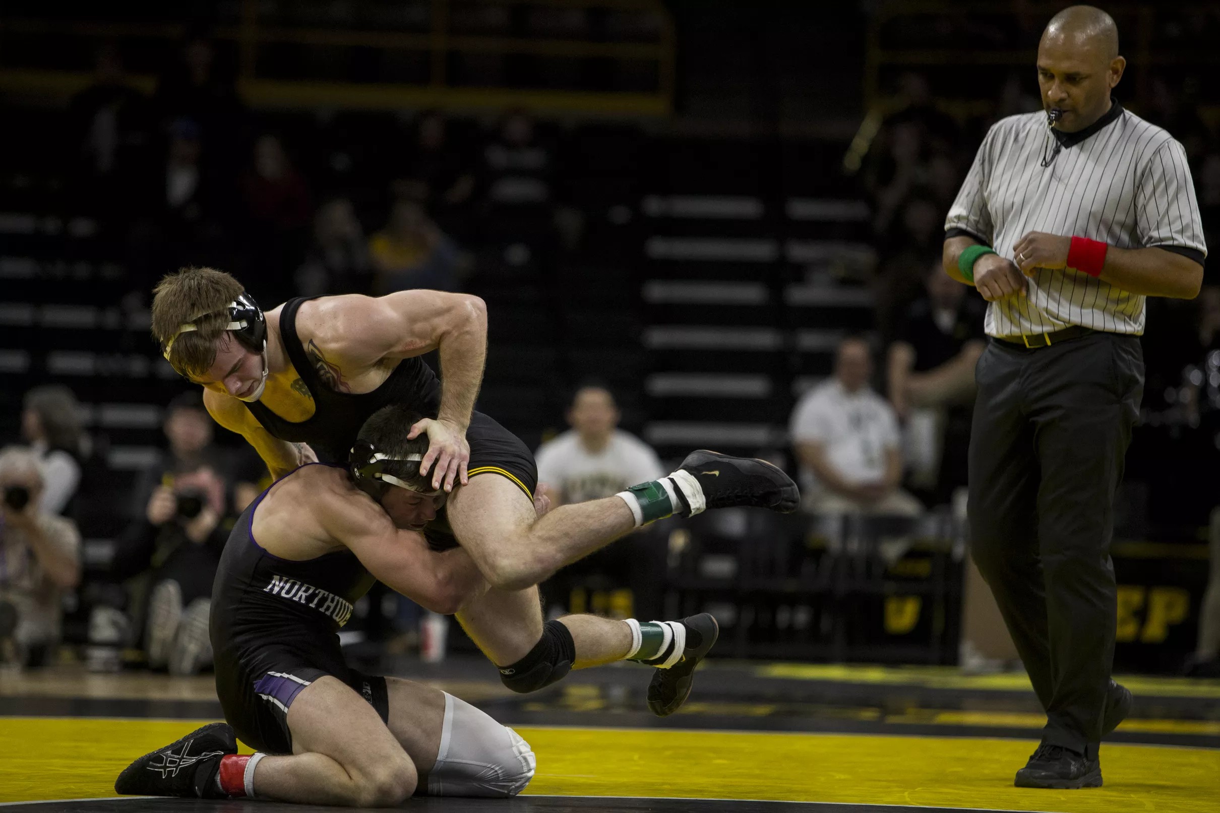 WRESTLING HAWKEYES DOWN NORTHWESTERN, 332