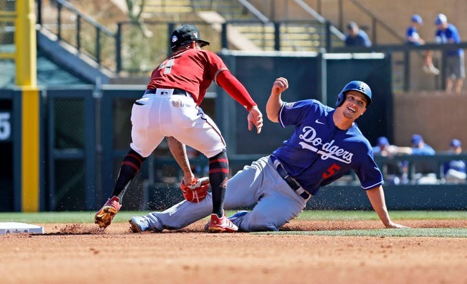 Arizona Diamondbacks shortstop Nick Ahmed throws out Detroit