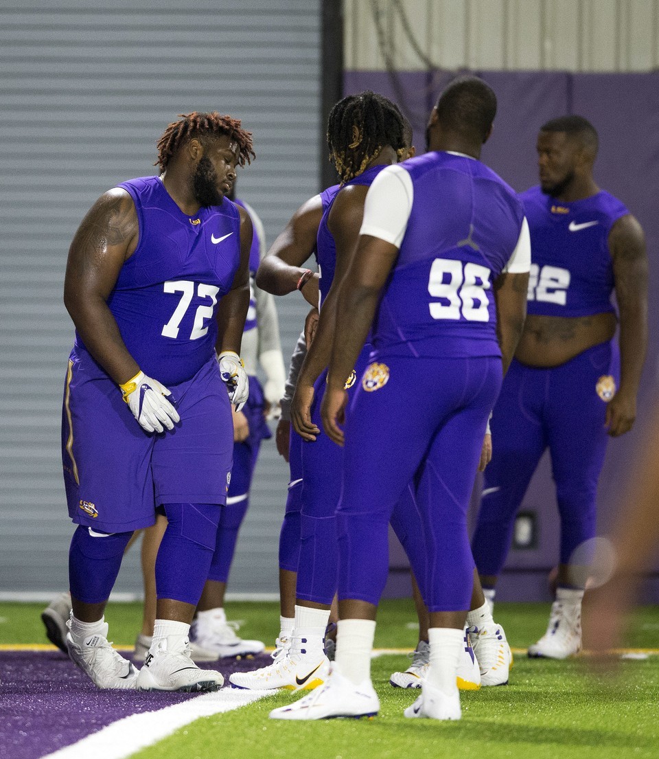 LSU nose tackle Tyler Shelvin doesn't make trip with team to Florida