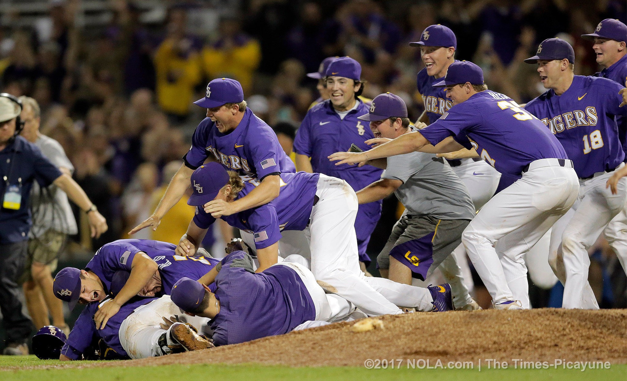 Who are 7 of the 8 College World Series teams joining LSU in Omaha?