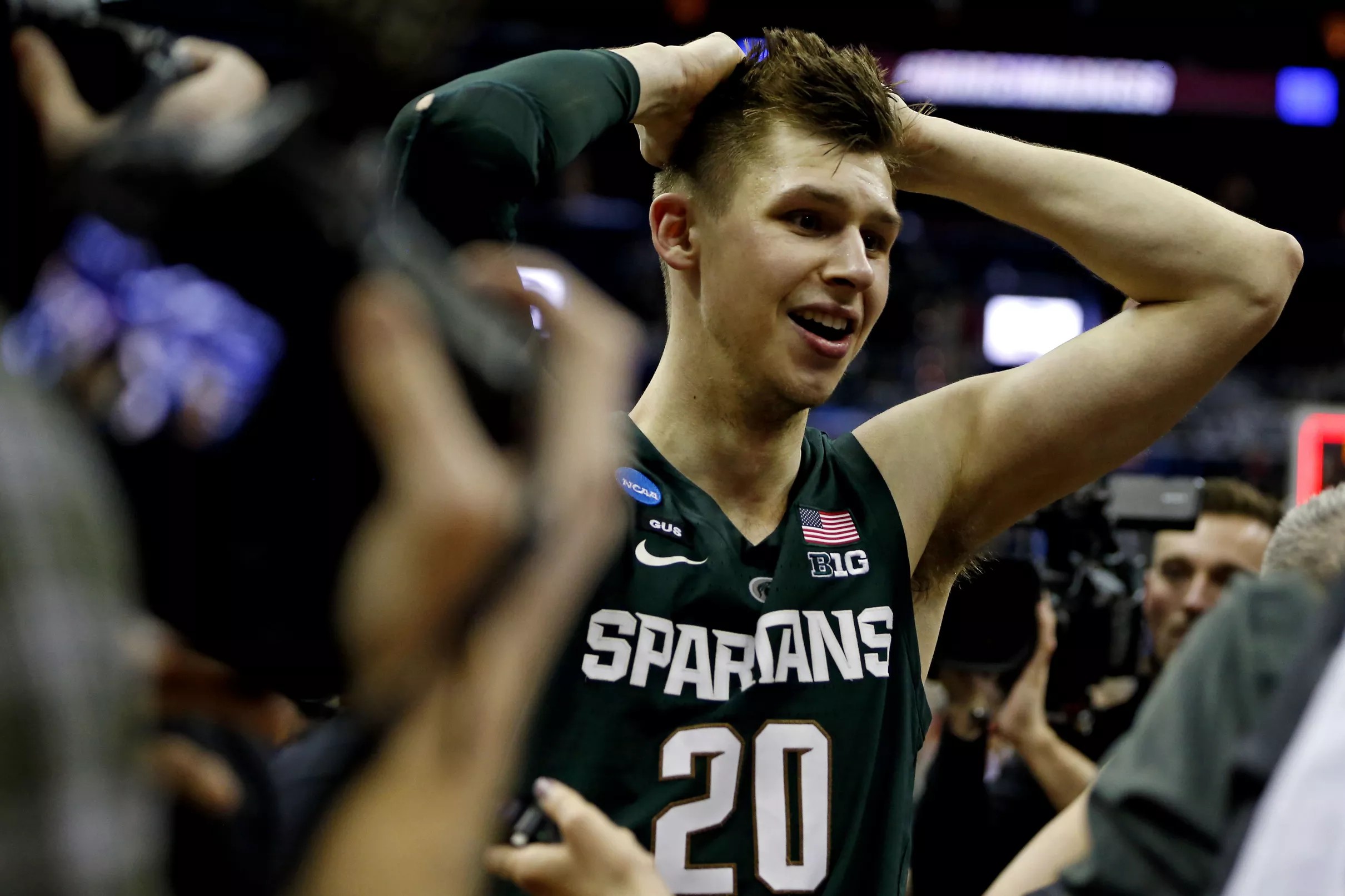 Michigan State captain Matt McQuaid signs with Detroit Pistons