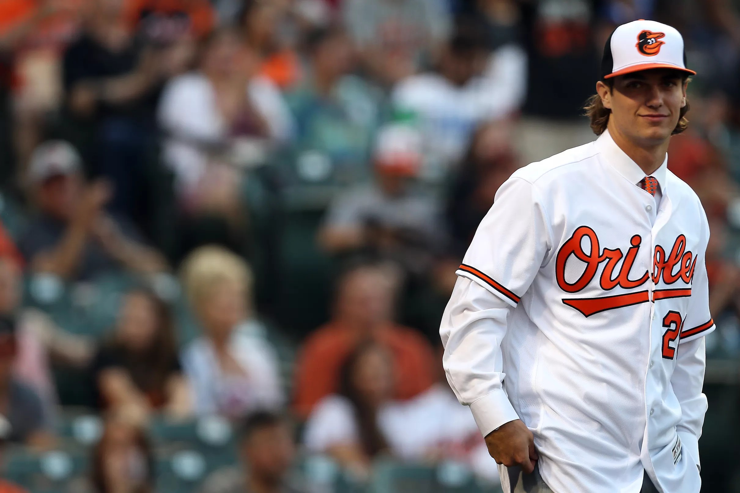 The Orioles added four players to the 40man roster yesterday to
