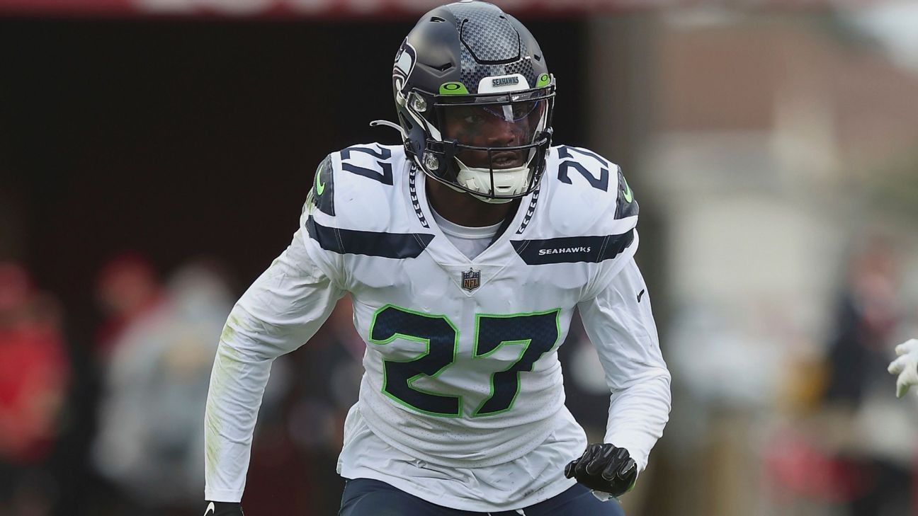 Seattle Seahawks cornerback Tariq Woolen (27) warms up before an NFL  football game against the Carolina