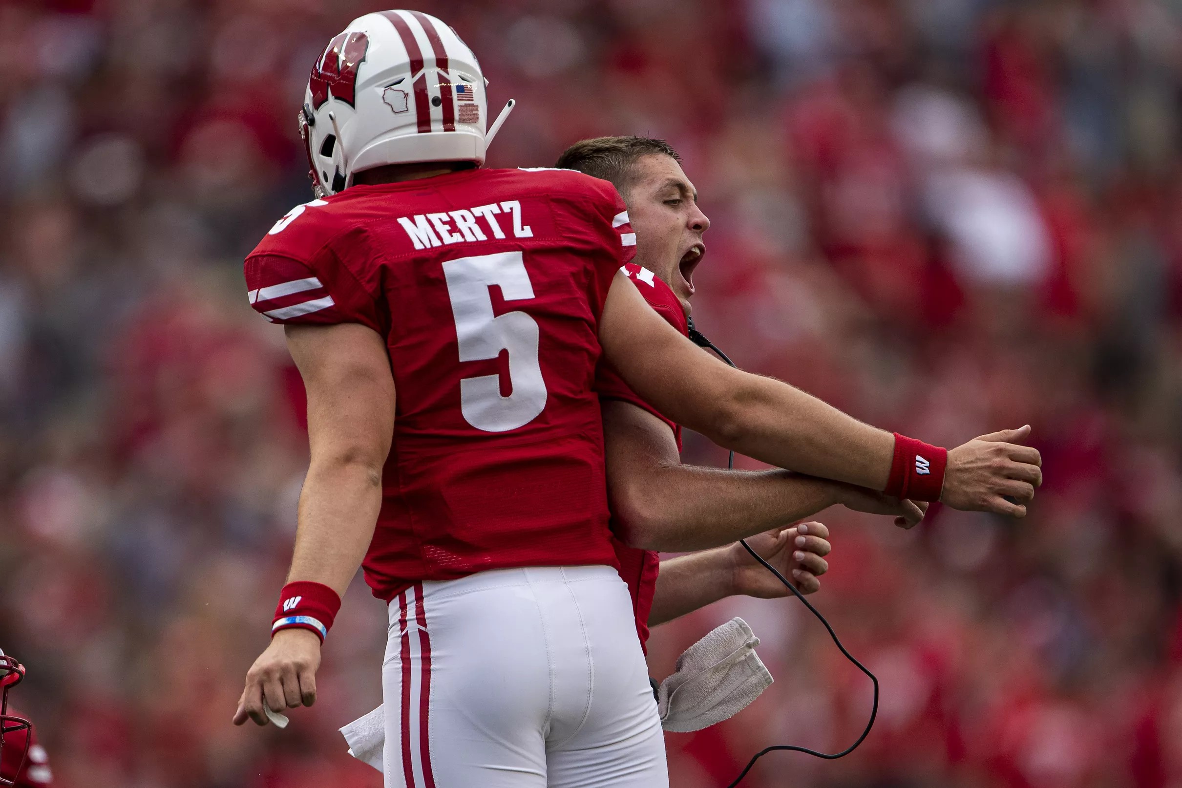 Wisconsin football: the Badgers climb in the polls despite not playing