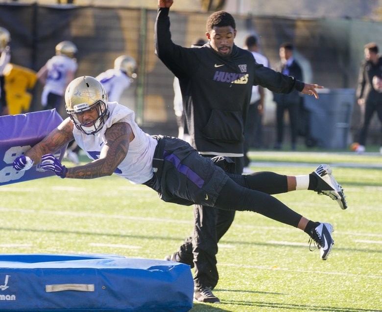 Former UW grad assistant Terrence Brown joins Jimmy Lake’s staff as