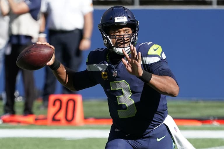 Russell Wilson 1st QB in NFL History to Throw 4Plus TDs in 1st