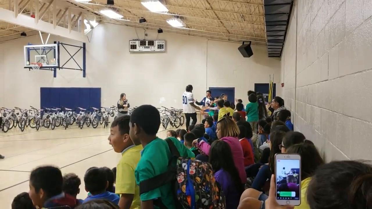 DeMarcus Lawrence and Tyrone Crawford at Boys and Girls Club