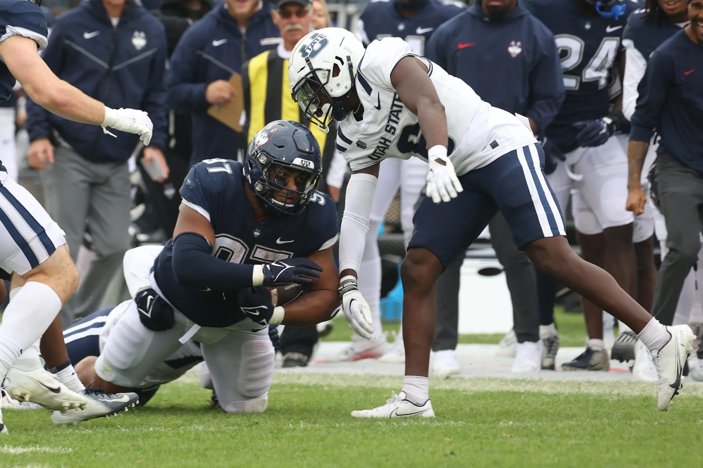 UConn football denied chance at first win as Utah State prevents tying  extra point, defeats Huskies, 34-33