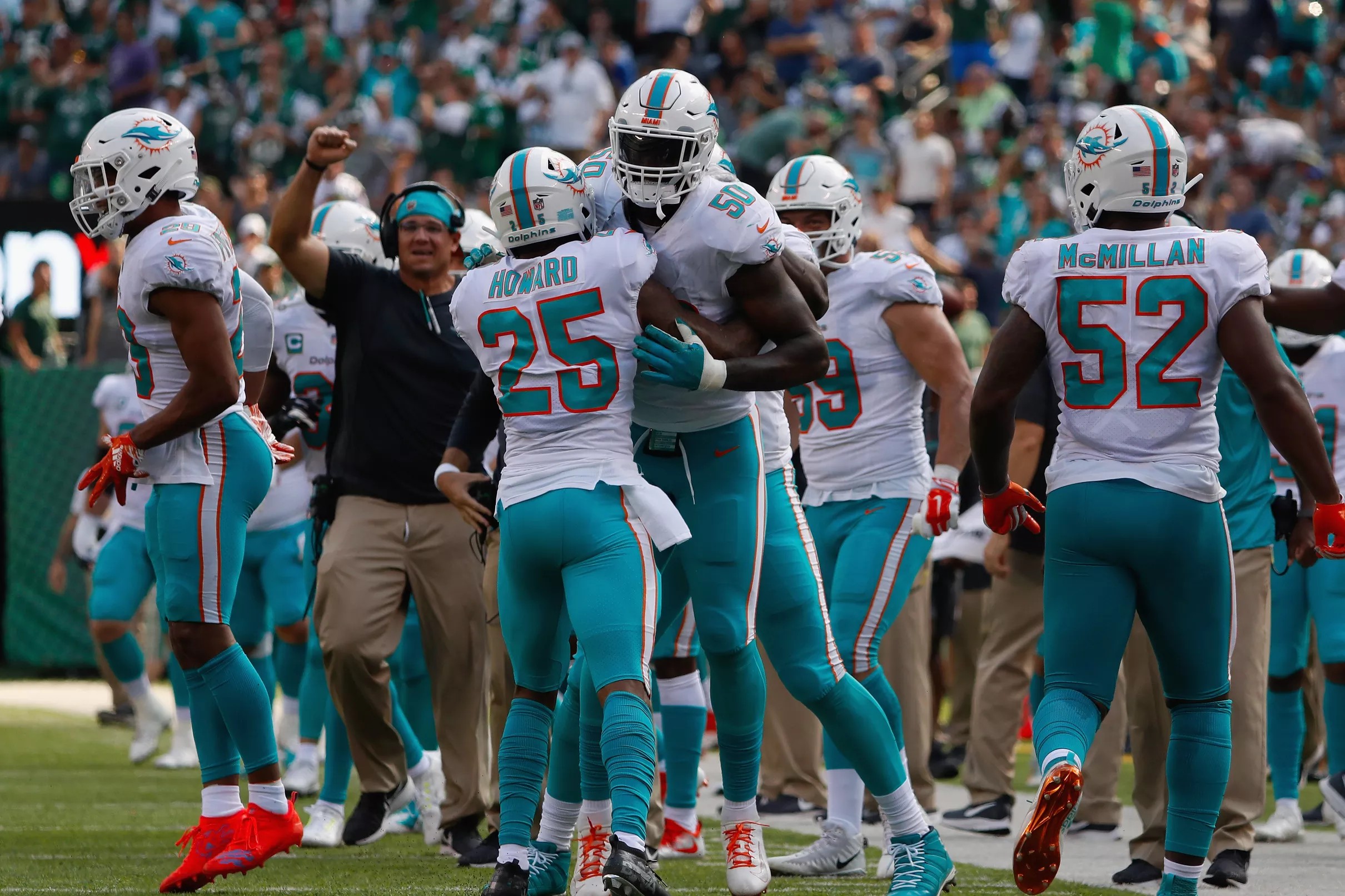 Dolphins Win A Slugfest In New York