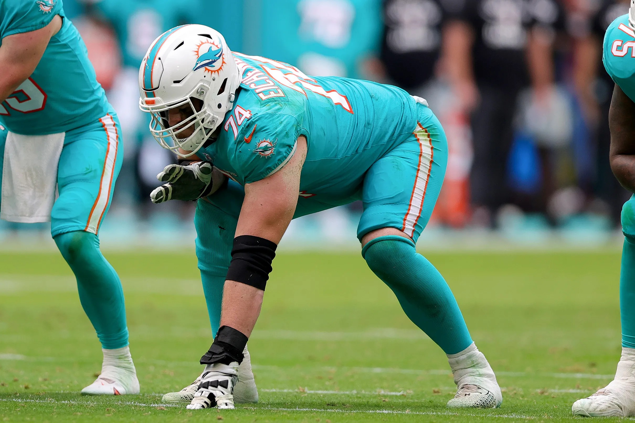 Dolphins orange jersey for practice player of the day tracker