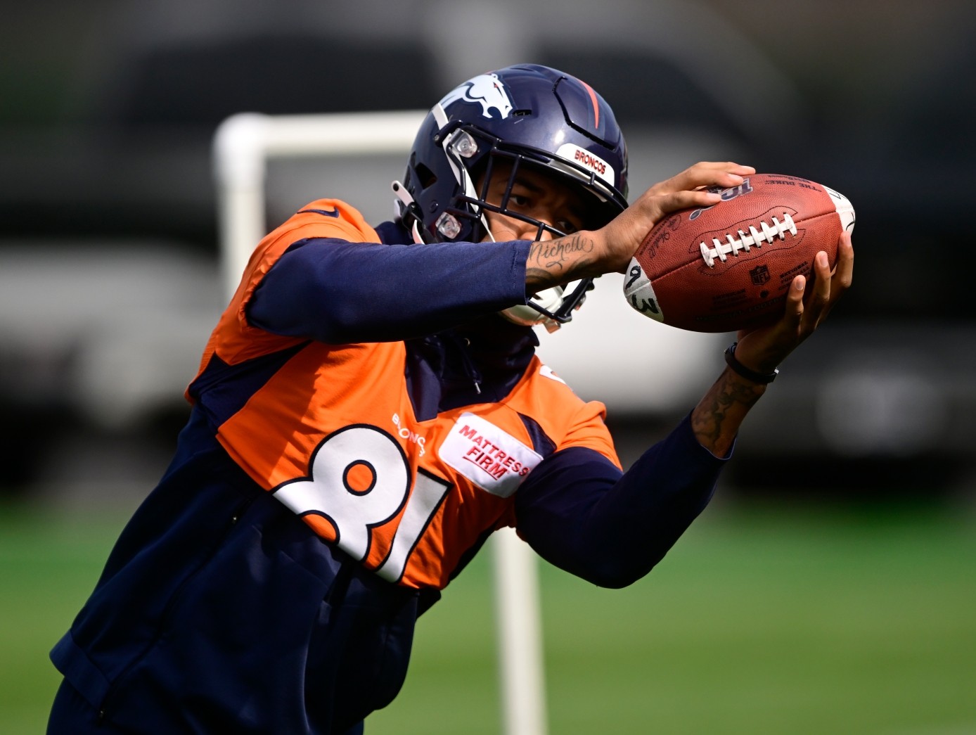 Broncos receiver Tim Patrick sustains right leg injury in practice