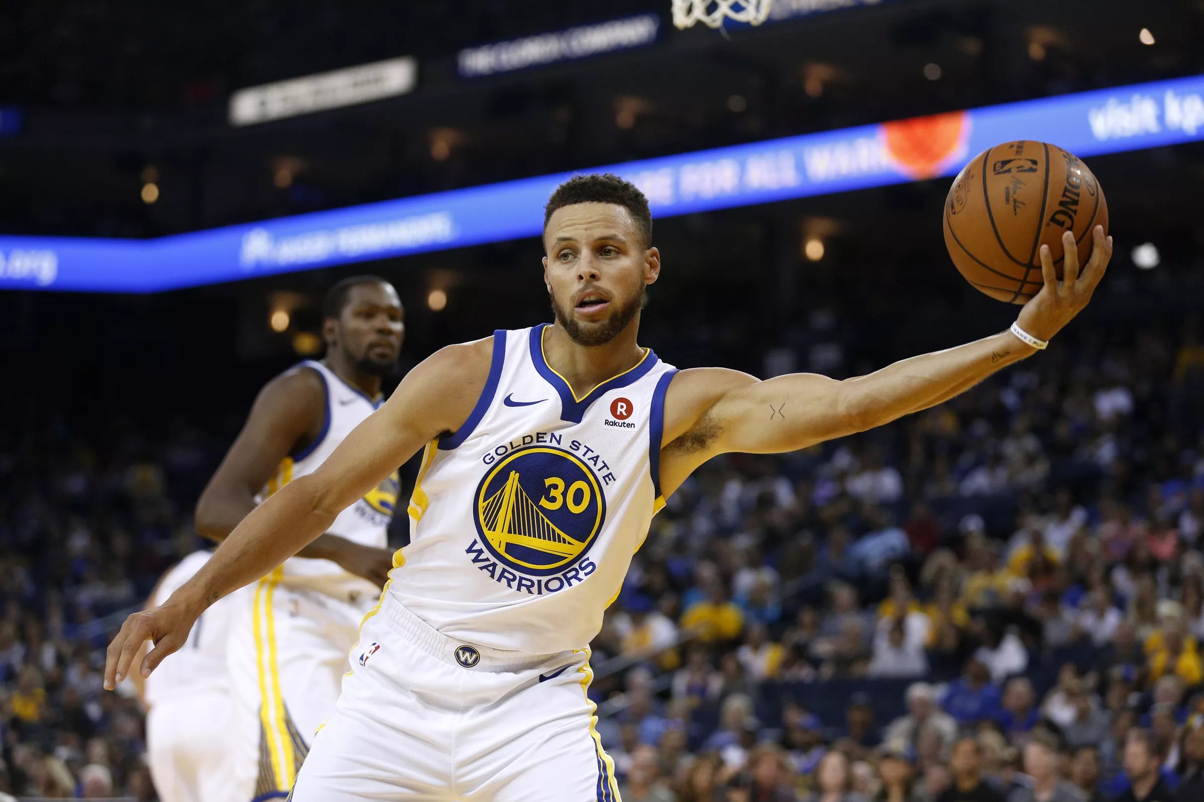 Warriors look listless, fall to Nuggets in preseason opener