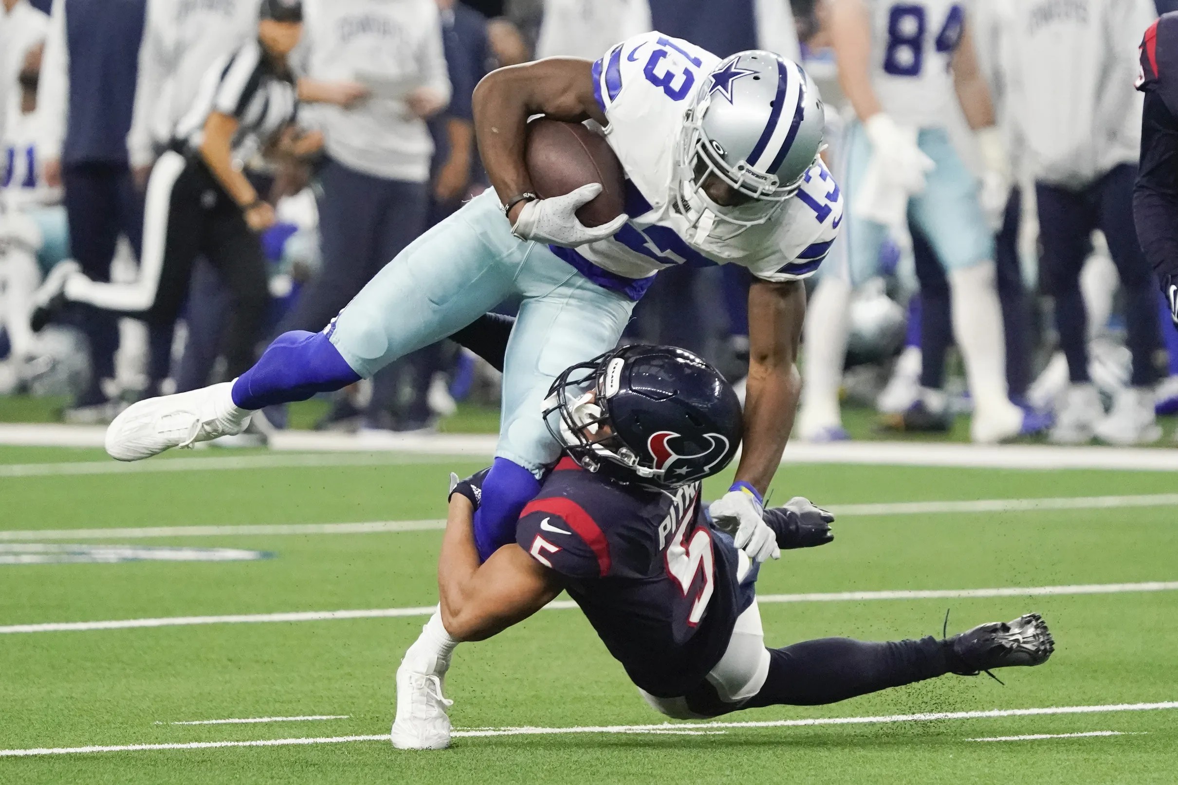 Texans safety Jalen Pitre “in good spirits,' day to day as he recovers from  bruised lung, not practicing yet