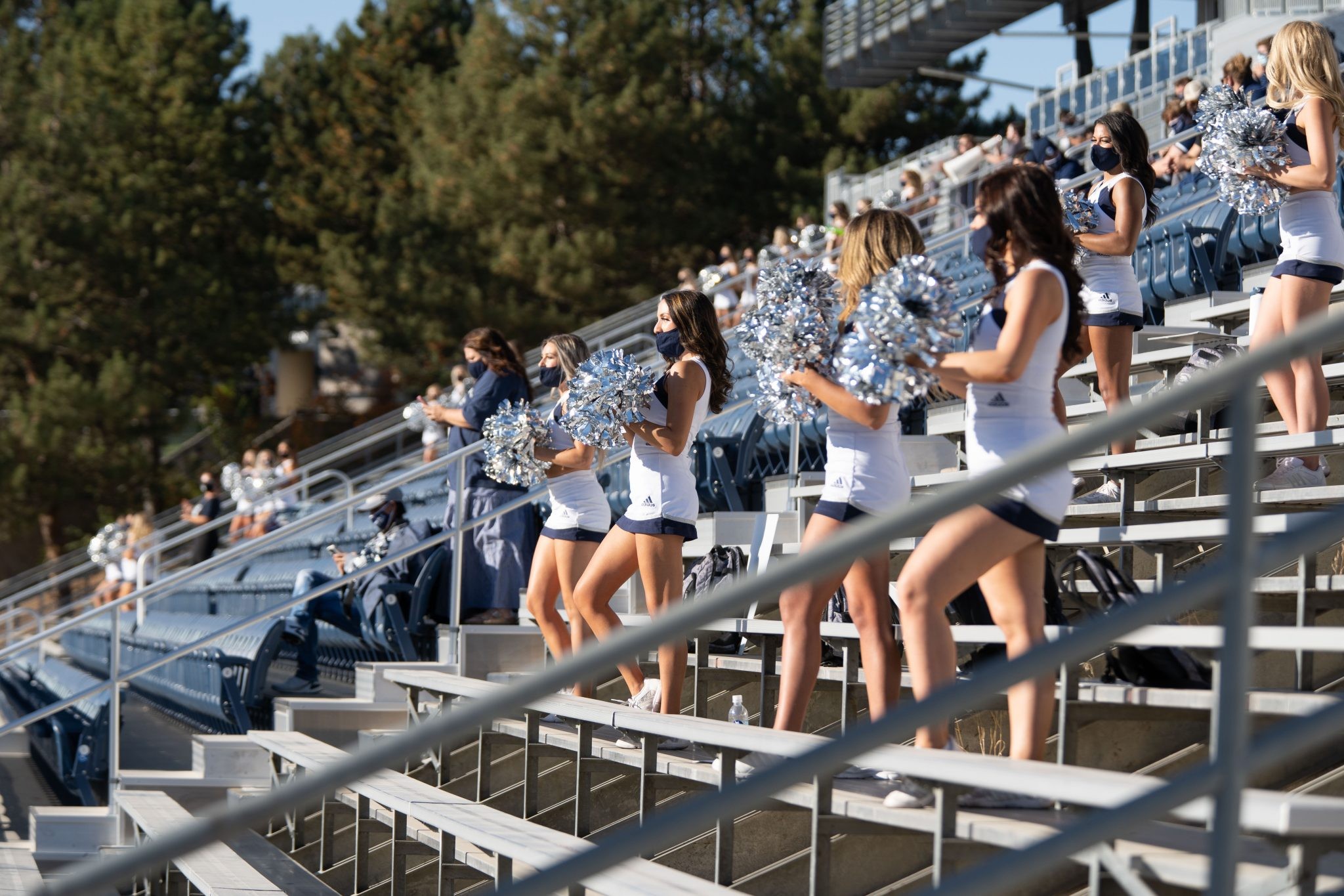 ‘We are in this together’ Nevada Cheerleading Team bonds through unprecedented season