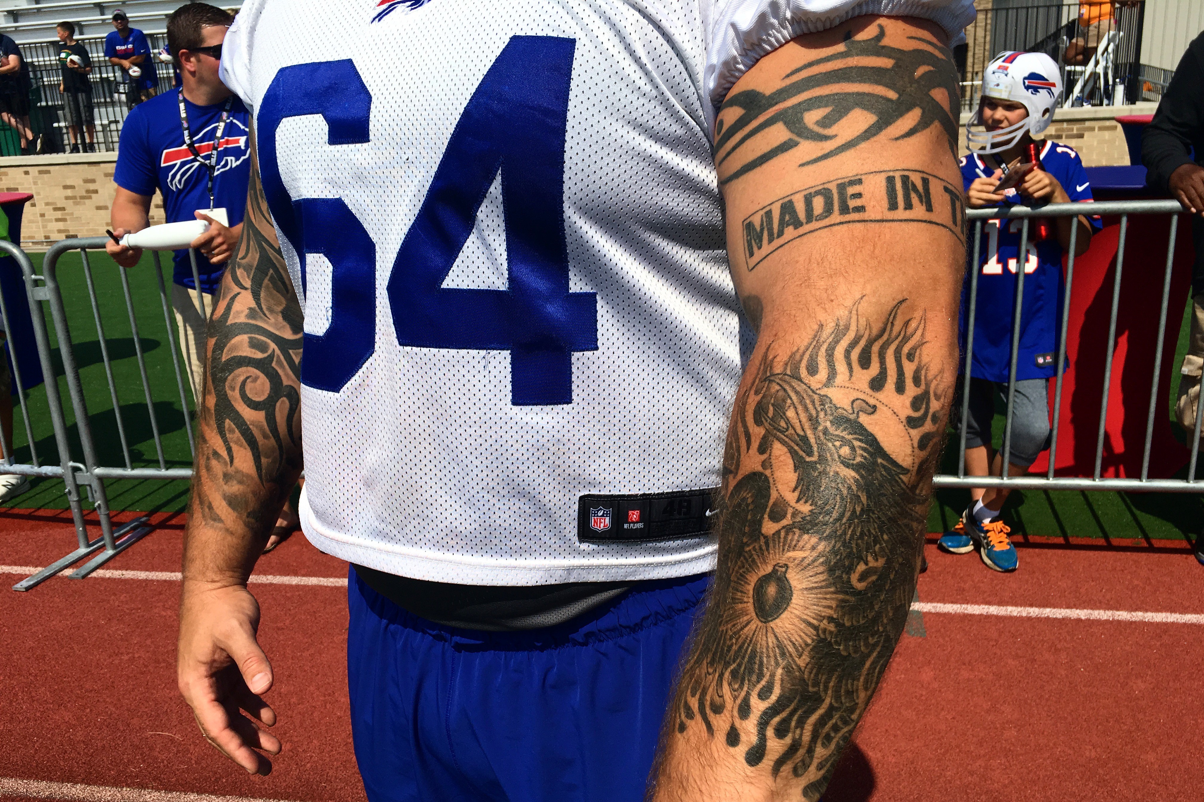 Cowboys quarterback Dak Prescott has a cartoon lion tattooed on his left sh...