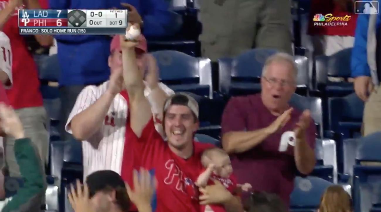 Watch Phillies Fan Catches Home Run Ball With One Hand While Holding Baby