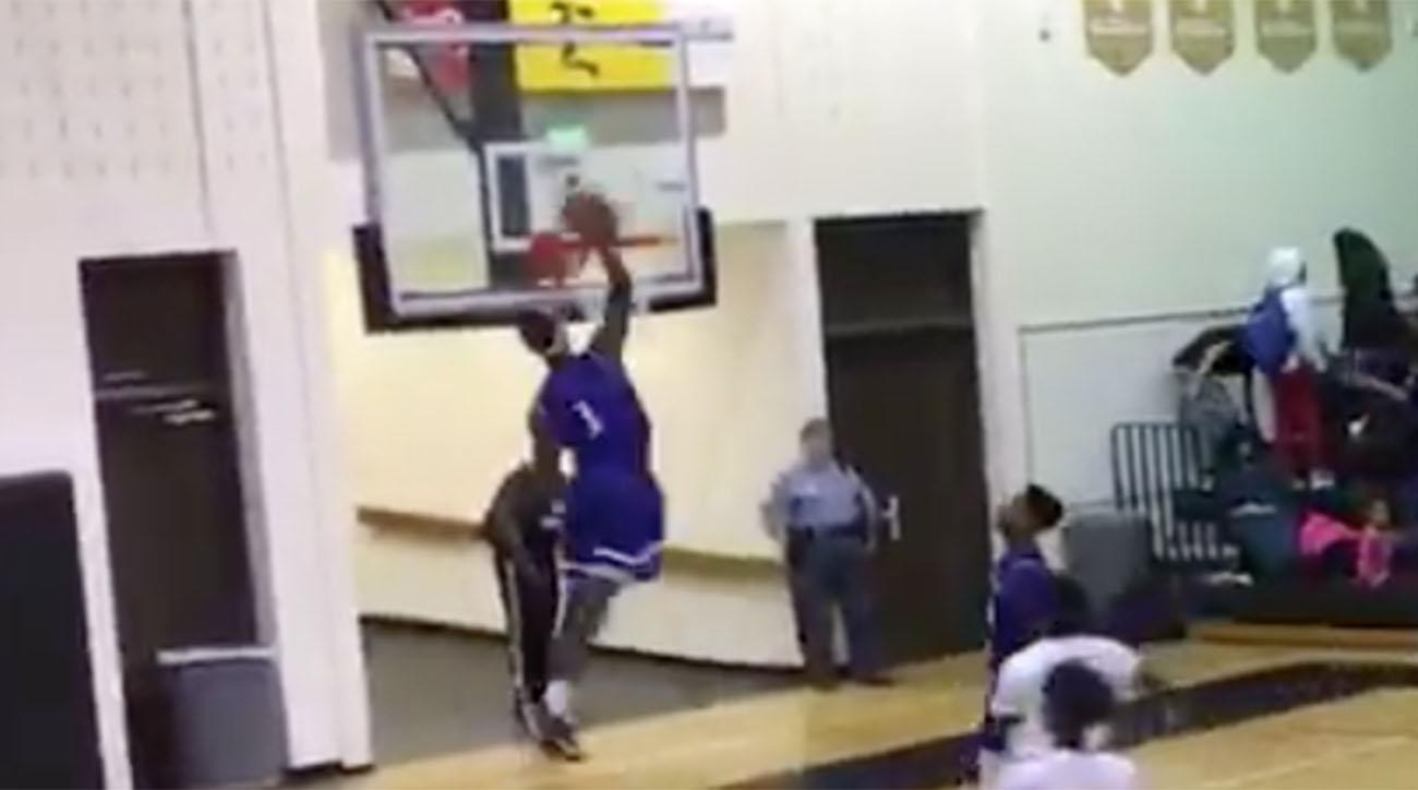 high-school-player-s-violent-dunk-breaks-backboard-ends-game