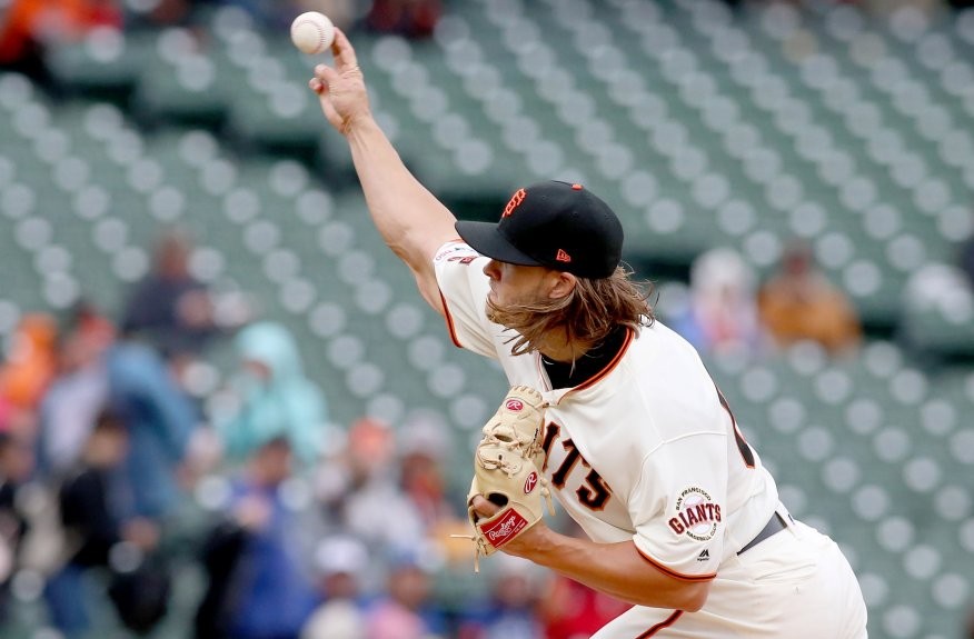 Giants’ Shaun Anderson shows off his bat and his arm