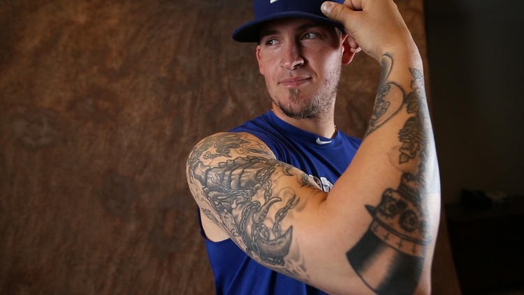 Tattoos tell the story of Dodgers catcher Yasmani Grandal 