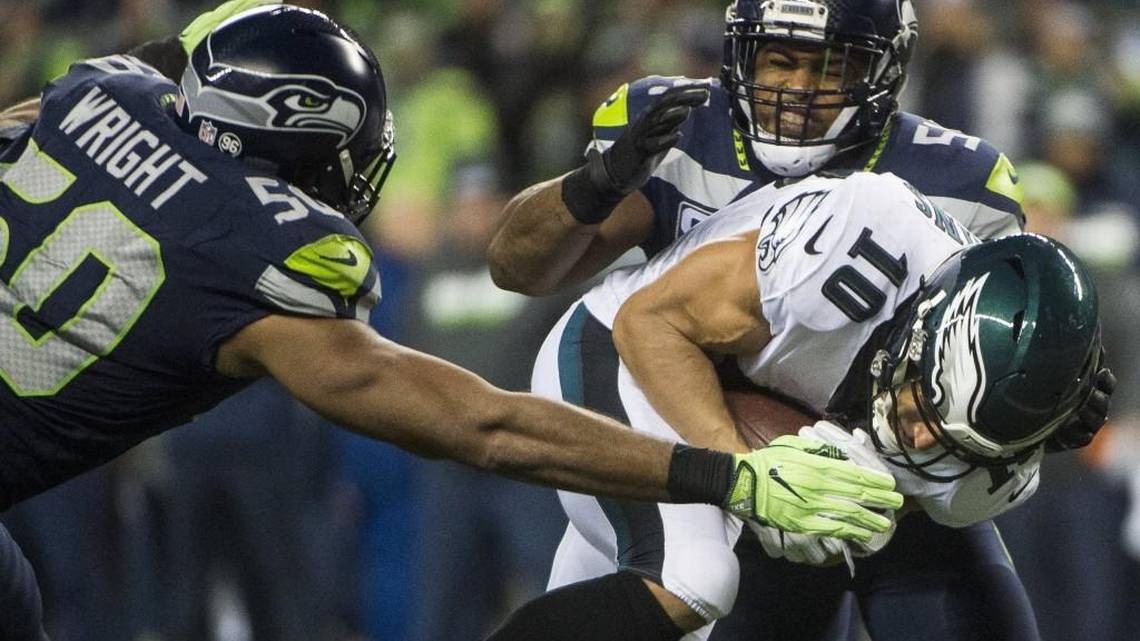 Seattle Seahawks� signs are Bobby Wagner will play, K.J