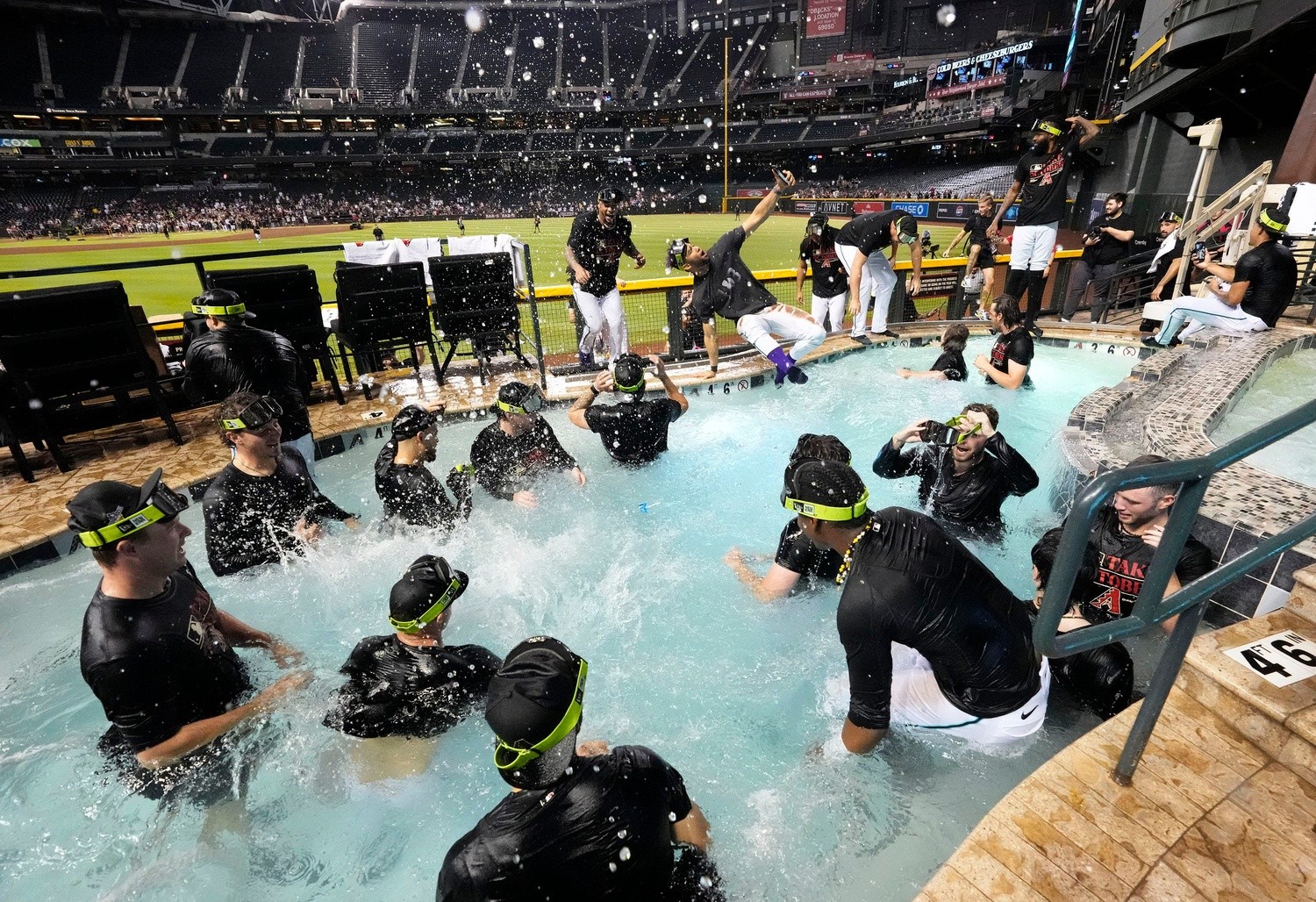 Diamondbacks CEO opens Chase Field pool to Dodgers’ celebrations if