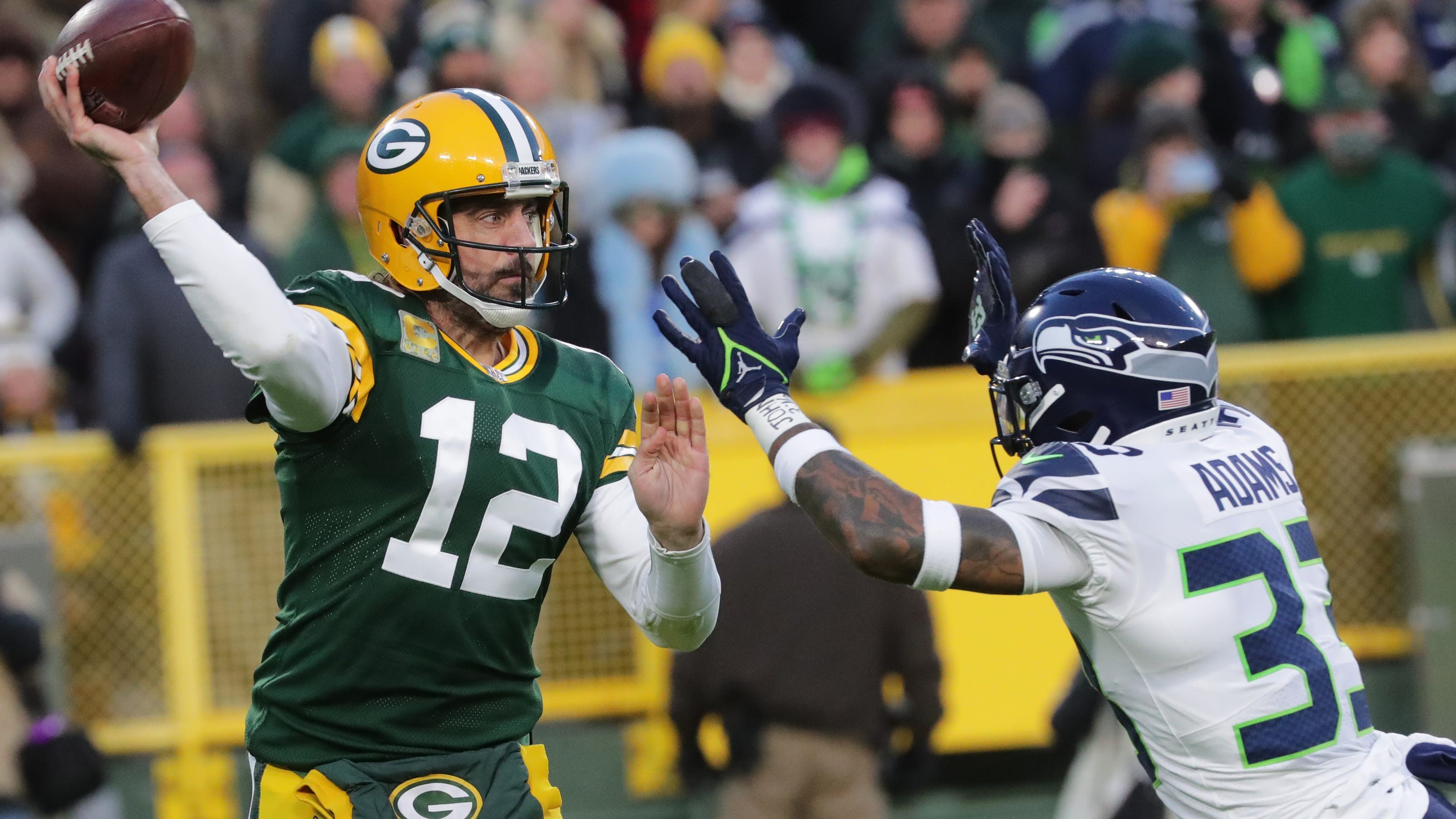 Green Bay Packers QB Aaron Rodgers 'definitely playing Sunday' despite