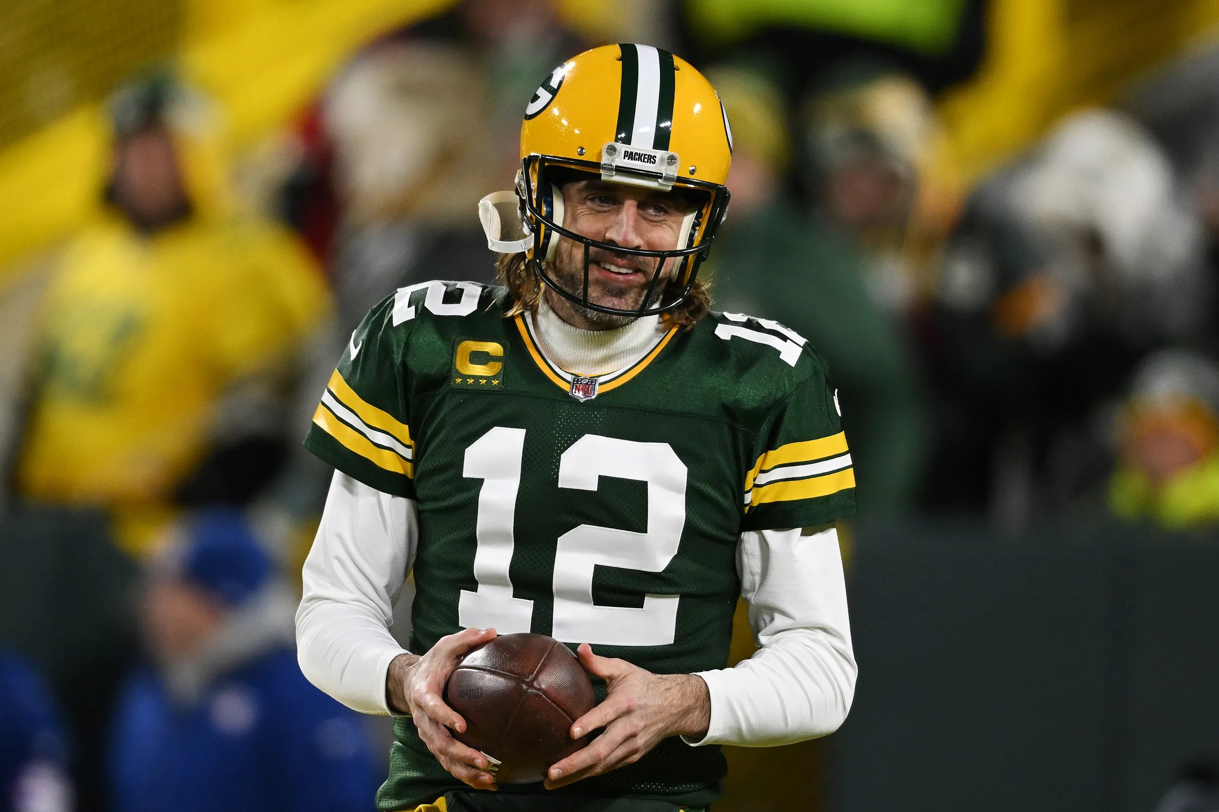 Aaron Rodgers signs contract extension, reduces 2022 cap hit by 18M