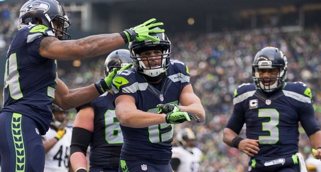 So what’s with that pointing-at-their-wrist thing the Seahawks ...