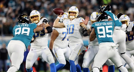 Trevor Lawrence, Jaguars rally from 27-point hole to beat Chargers in AFC  wild-card round - Newsday