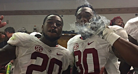 Alabama Players Enjoy Victory Cigars Following Blowout Win