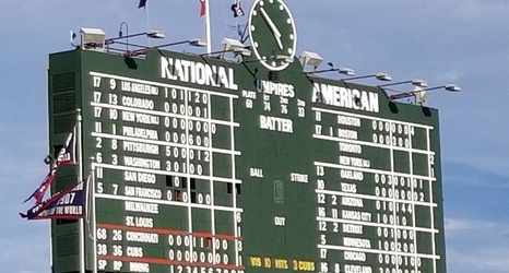 A day in the life of baseball, via the iconic Wrigley Field scoreboard