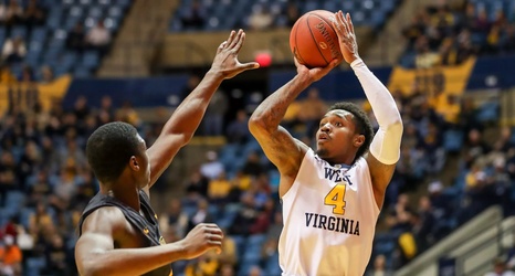 WVU Wins Ugly, Tops Coppin State As Miles Records 1,000th Point