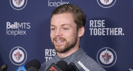 josh morrissey teammates returns ice winnipeg jets