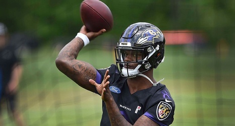 ravens microscope lamar arm camp training under jackson