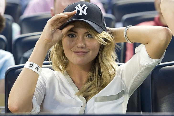 MLB Yankees Baseball Female Fan in Midtown Manhattan, NYC Stock Photo -  Alamy