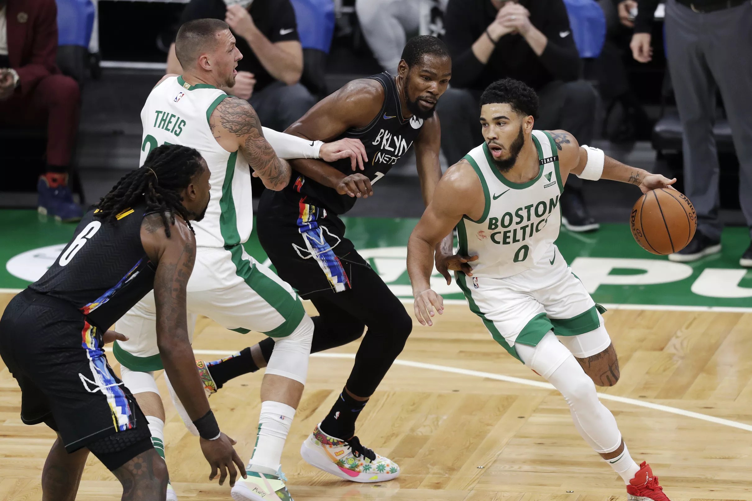 Must C’s: Jayson Tatum drills a turnaround three-pointer over Kyrie Irving