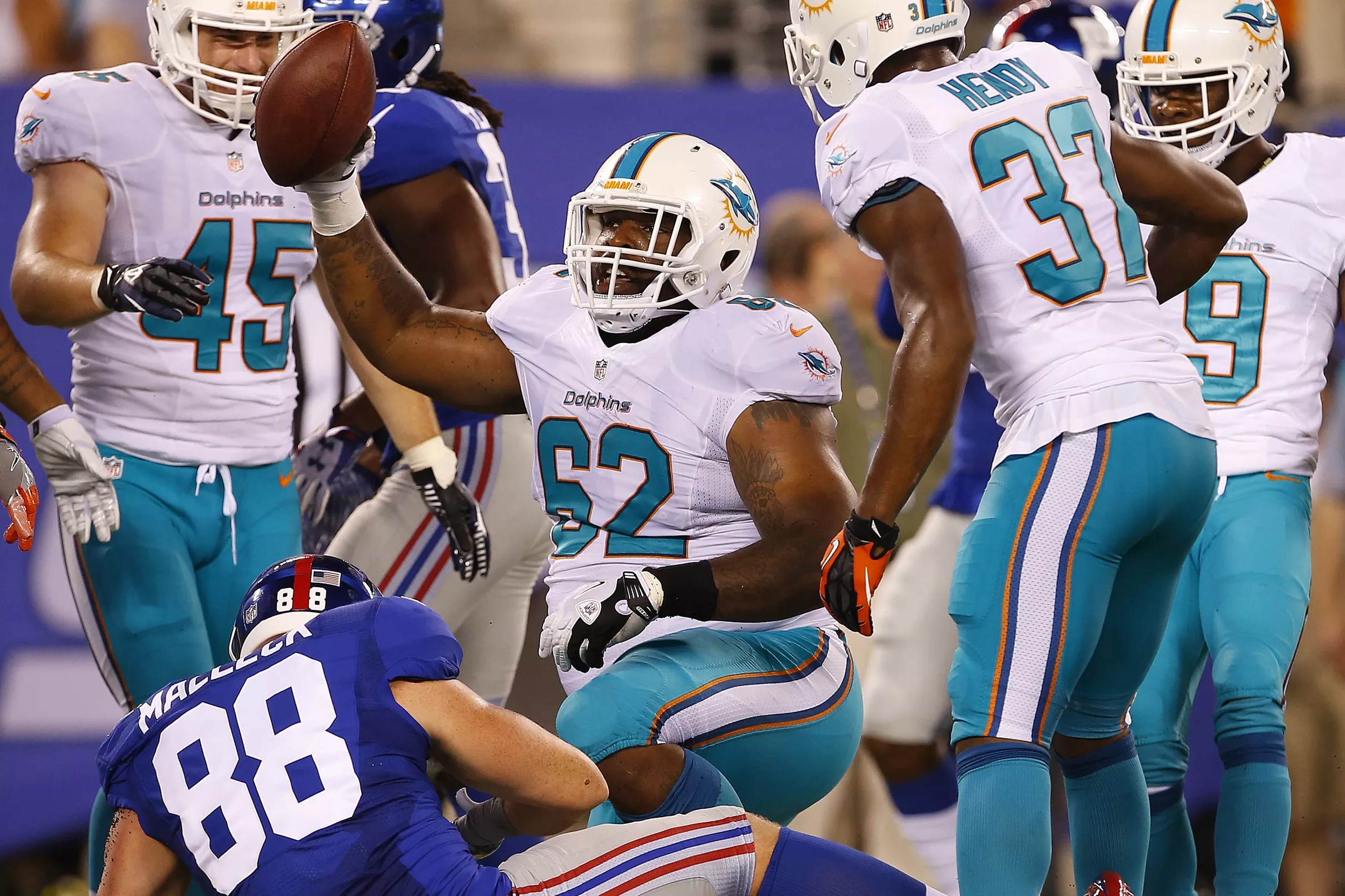 Patriots bring in a former Dolphins and Bills defensive tackle for a ...