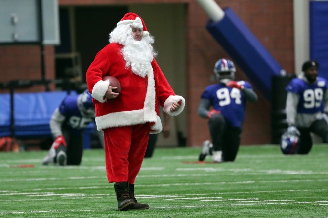 Santa Claus shows off his skills at Giants practice