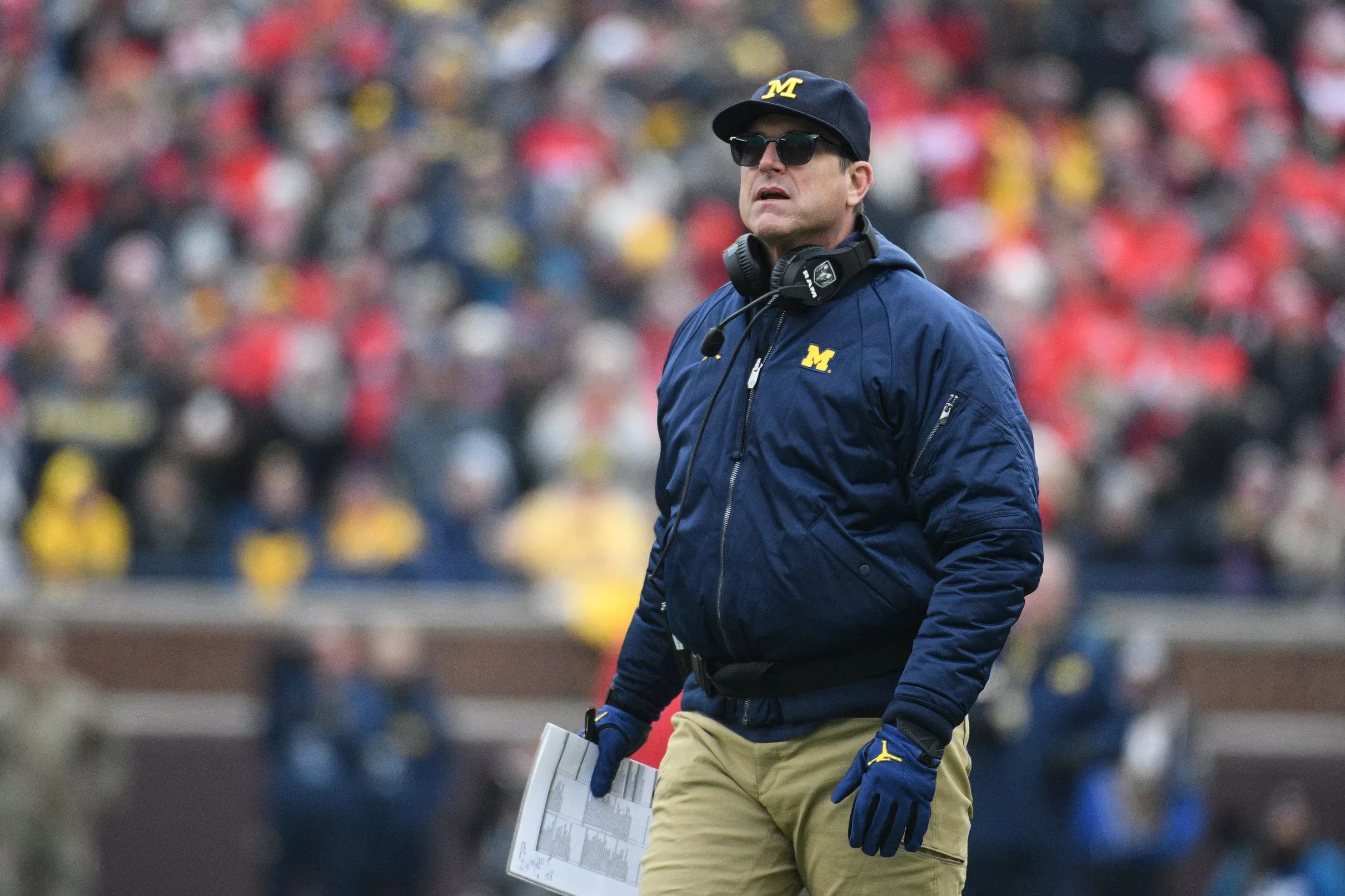 Harbaugh’s contract still dragging out, debunking conspiracies, Iowa ...