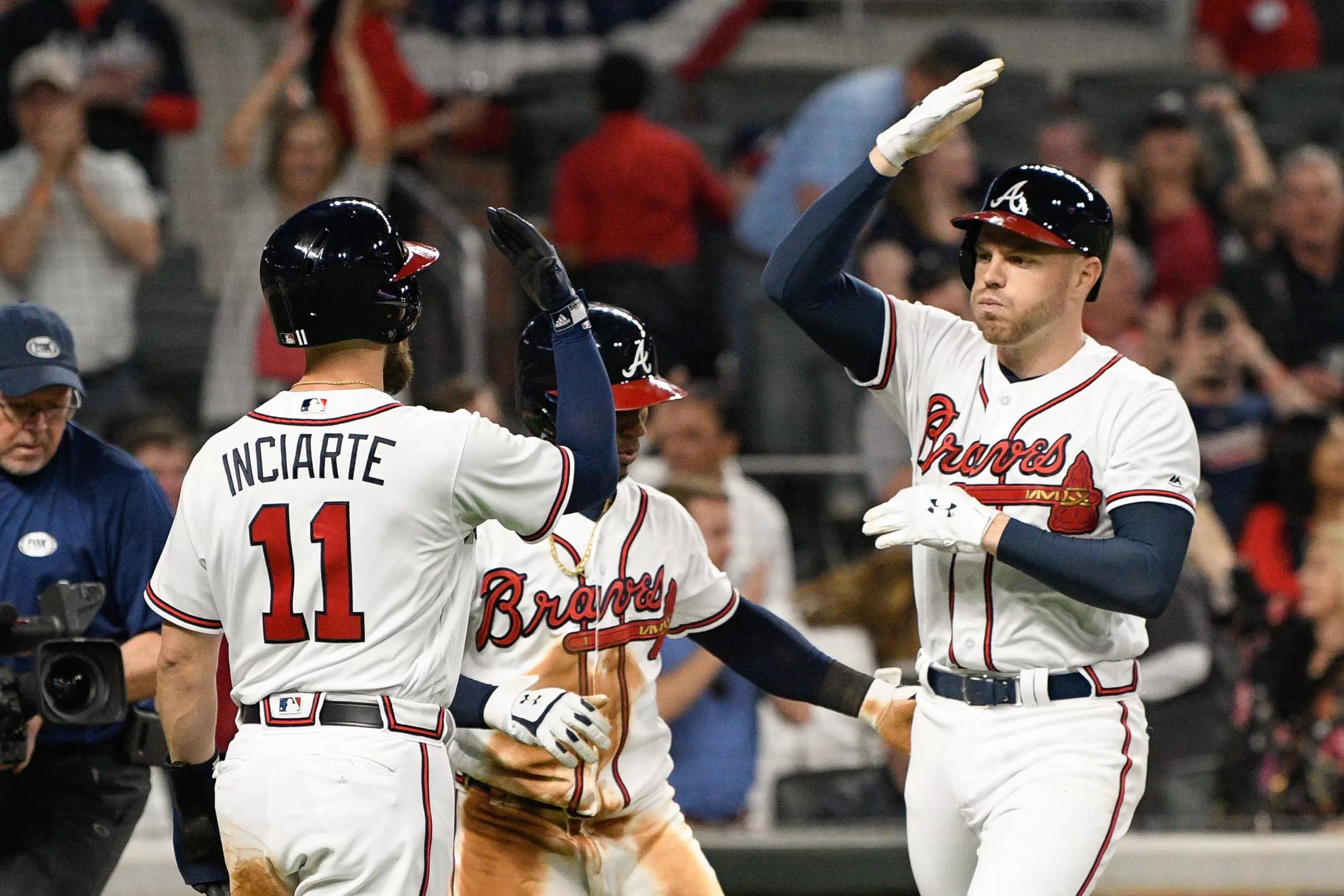 Braves hand Nationals their first loss of the season, 13-6