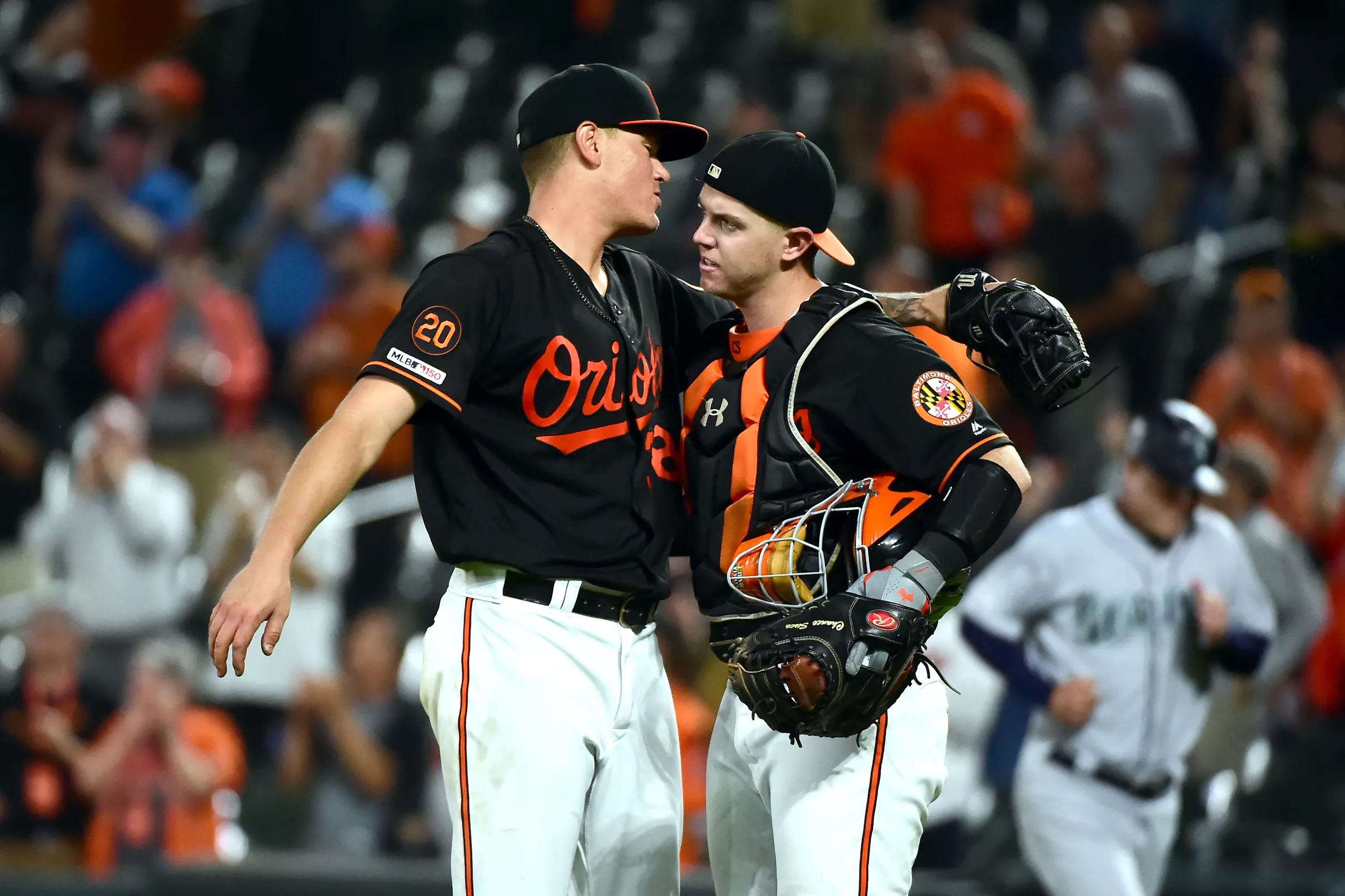 Orioles defeat Mariners 5-3 for 50th win of the year